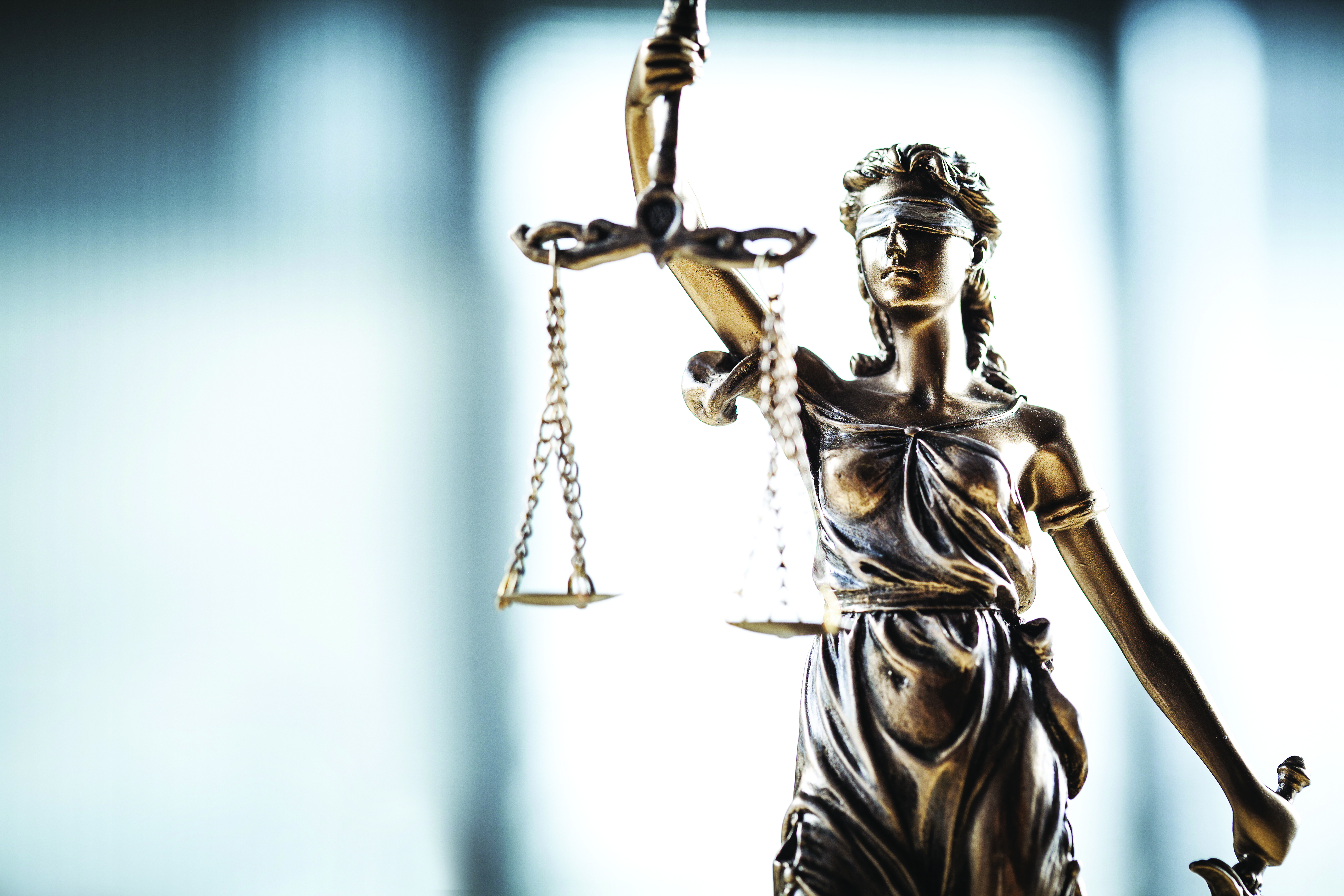 Lady Justice holding scales of justice